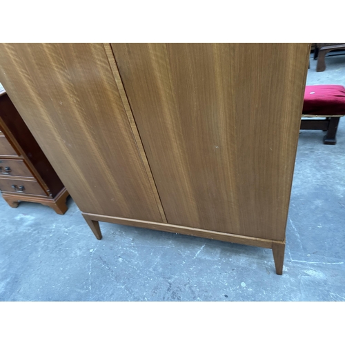 3003 - A RETRO TEAK TWO DOOR WARDROBE BY ALFRED COX 38