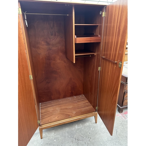 3003 - A RETRO TEAK TWO DOOR WARDROBE BY ALFRED COX 38