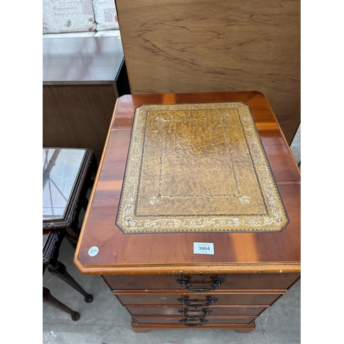 3004 - A YEW WOOD TWO DRAWER FILING CABINET WITH INSET LEATHER TOP