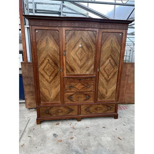 2930 - AN EDWARDIAN MAHOGANY AND WALNUT WARDROBE WITH TWO HANGING COMPARTMENTS, CENTRAL CUPBOARD AND FOUR D... 