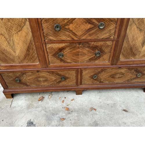 2930 - AN EDWARDIAN MAHOGANY AND WALNUT WARDROBE WITH TWO HANGING COMPARTMENTS, CENTRAL CUPBOARD AND FOUR D... 