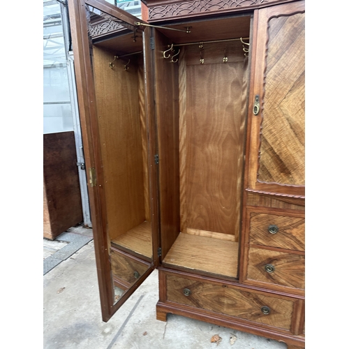 2930 - AN EDWARDIAN MAHOGANY AND WALNUT WARDROBE WITH TWO HANGING COMPARTMENTS, CENTRAL CUPBOARD AND FOUR D... 