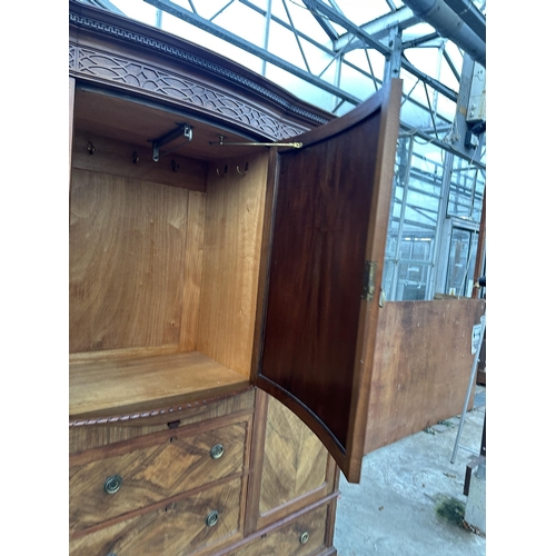 2930 - AN EDWARDIAN MAHOGANY AND WALNUT WARDROBE WITH TWO HANGING COMPARTMENTS, CENTRAL CUPBOARD AND FOUR D... 