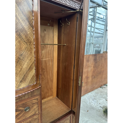 2930 - AN EDWARDIAN MAHOGANY AND WALNUT WARDROBE WITH TWO HANGING COMPARTMENTS, CENTRAL CUPBOARD AND FOUR D... 