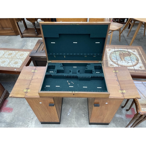 2900 - A WALNUT ART DECO TWIN PEDESTAL CANTEEN WITH TWO BASE ENCLOSING TWO CUPBOARDS, 35