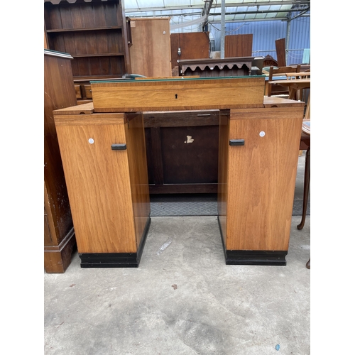 2900 - A WALNUT ART DECO TWIN PEDESTAL CANTEEN WITH TWO BASE ENCLOSING TWO CUPBOARDS, 35