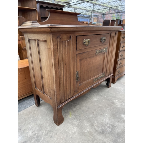 2902 - AN ART NOUVEAU  SIDEBOARD WITH SINGLE DOOR AND DRAWER WITH EMBOSSED BRASS HINGES AND HANDLES, 48