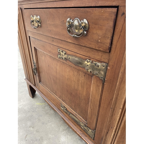 2902 - AN ART NOUVEAU  SIDEBOARD WITH SINGLE DOOR AND DRAWER WITH EMBOSSED BRASS HINGES AND HANDLES, 48