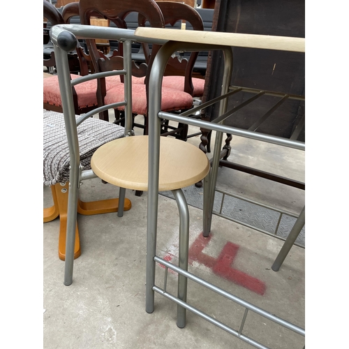 2911 - A TUBULAR METAL PATIO TABLE AND MATCHING CHAIR.