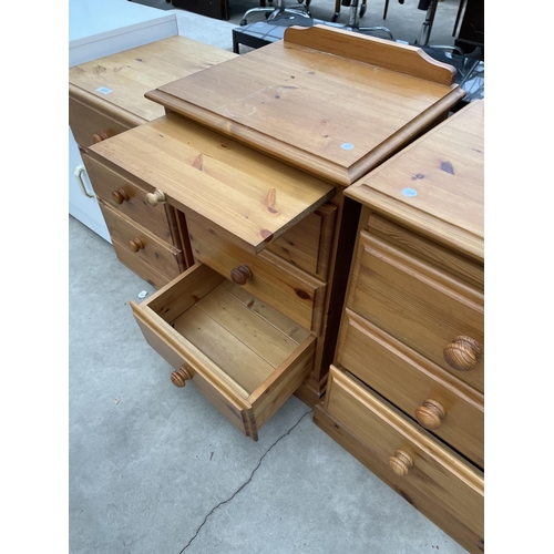 2914 - A PAIR OF PINE THREE DRAWER BEDSIDE CHESTS WITH PULL OUT SLIDES