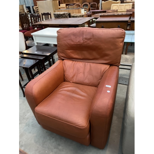 2918 - A BROWN LEATHER EASY CHAIR.