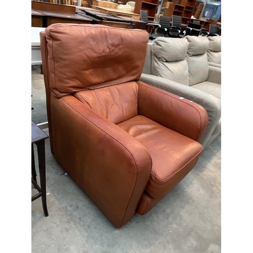 2918 - A BROWN LEATHER EASY CHAIR.