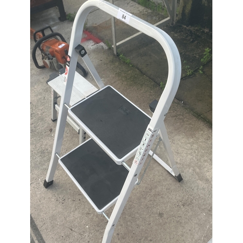 84 - A TWO RUNG NON SLIP DELXO STEP LADDER AND A FURTHER FOLDING ALUMINIUM STEP NO VAT