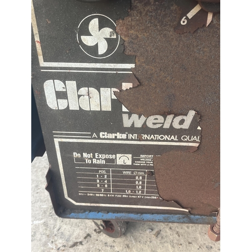 99 - A CLARKE WELD TURBO 250T MIG WELDER WITH TROLLEY BASE NO VAT