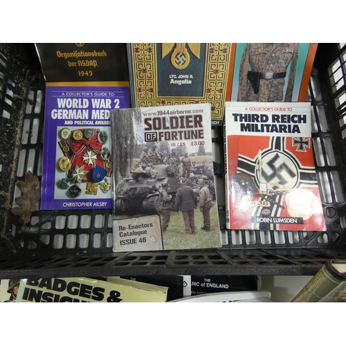 345 - A COLLECTION OF SIXTEEN BOOKS ON NAZI GERMANY DURING WORLD WAR II, SUBJECTS TO INCLUDE NAZI BADGES, ... 