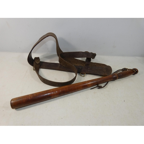 414 - A BRITISH LEATHER SAM BROWNE, WOODEN TRUNCHEON, LENGTH 56CM