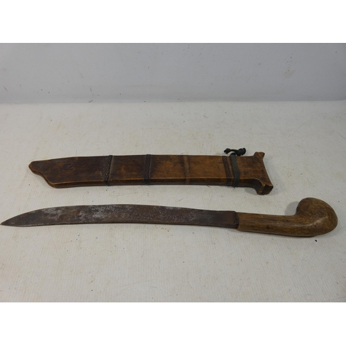 415 - AN ASIAN KNIFE AND WOODEN SCABBARD, 31CM BLADE, LENGTH 51CM