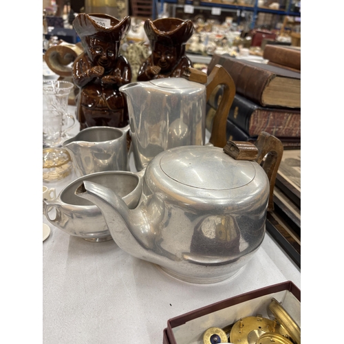 119 - A VINTAGE PICQUOT WARE TEASET TO INCLUDE A TEAPOT, HOT WATER POT, CREAM JUG AND SUGAR BOWL