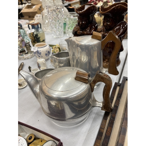 119 - A VINTAGE PICQUOT WARE TEASET TO INCLUDE A TEAPOT, HOT WATER POT, CREAM JUG AND SUGAR BOWL