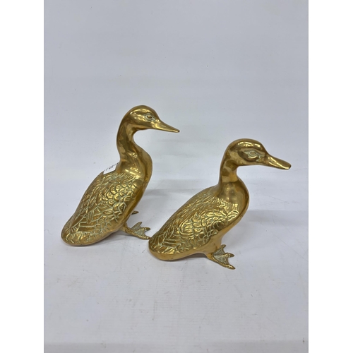 1287 - TWO LARGE HEAVY BRASS DUCKS - 10 INCH LONG