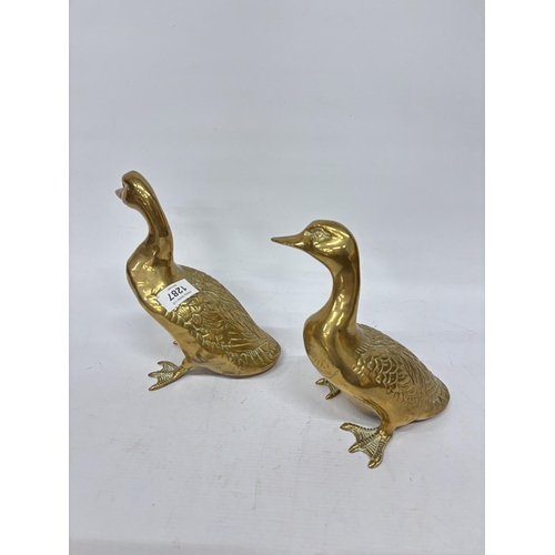 1287 - TWO LARGE HEAVY BRASS DUCKS - 10 INCH LONG