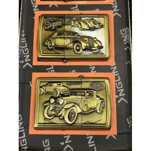 1306 - A BOX SET OF FOUR BRASS LIGHTERS WITH IMAGES OF AMERICAN VINTAGE CARS