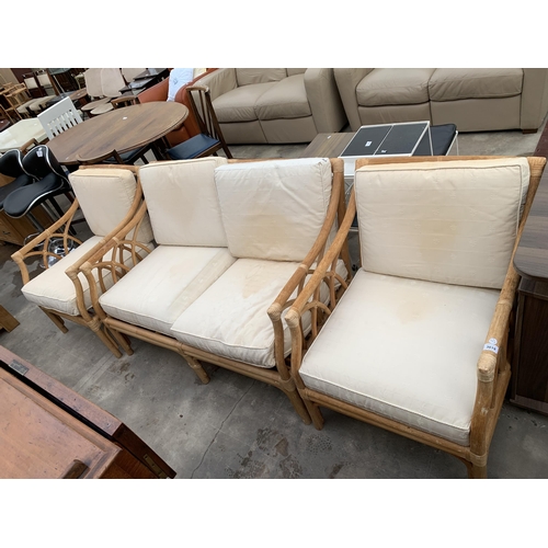 3019 - A BAMBOO AND WICKER THREE PIECE LOUNGE SUITE.