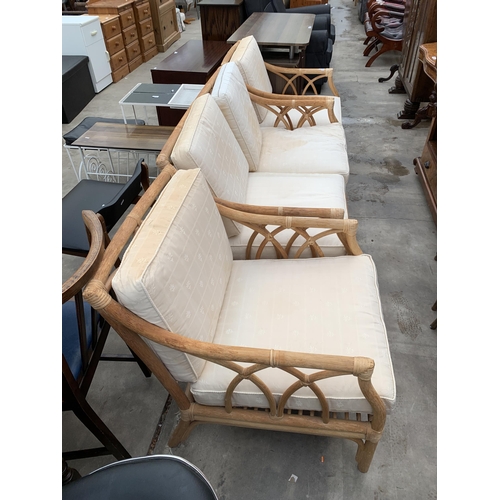 3019 - A BAMBOO AND WICKER THREE PIECE LOUNGE SUITE.