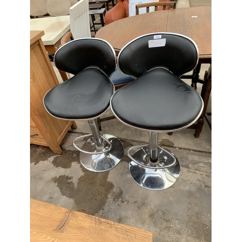 3020 - A PAIR OF PUMP STOOLS ON POLISHED CHROME BASES