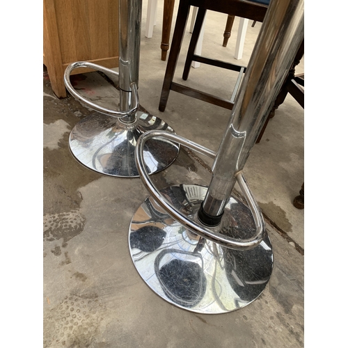 3020 - A PAIR OF PUMP STOOLS ON POLISHED CHROME BASES