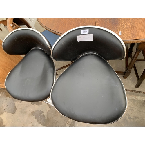 3020 - A PAIR OF PUMP STOOLS ON POLISHED CHROME BASES