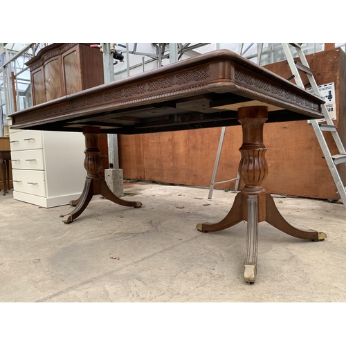 3032 - A REGENCY STYLE TWIN-PEDESTAL DINING TABLE