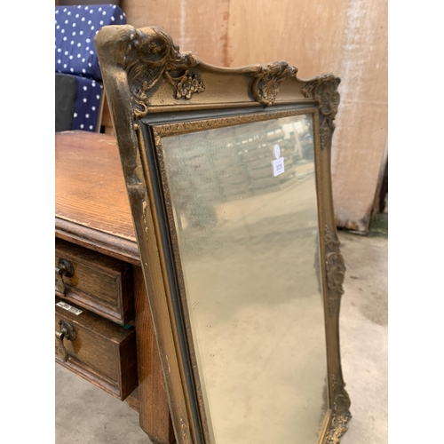 3039 - A GILT WALL MIRROR, 31