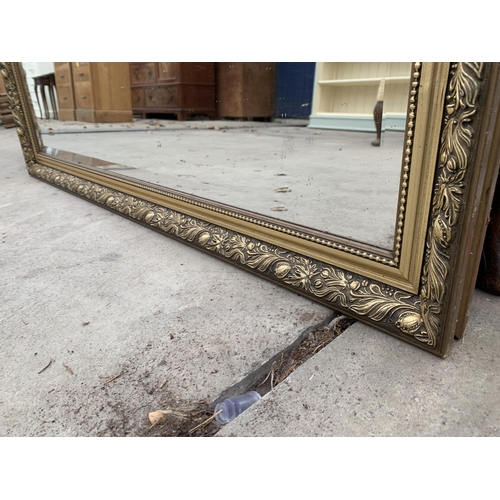 3039 - A GILT WALL MIRROR, 31