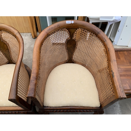 3046 - A PAIR OF BERGERE TUB CHAIRS WITH FRONT CABRIOLE LEGS WITH BALL AND CLAW FEET