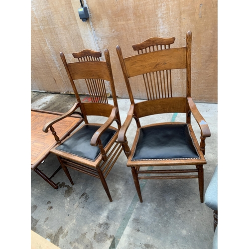 3048 - A PAIR OF ARTS AND CRAFTS OAK ARM CHAIRS