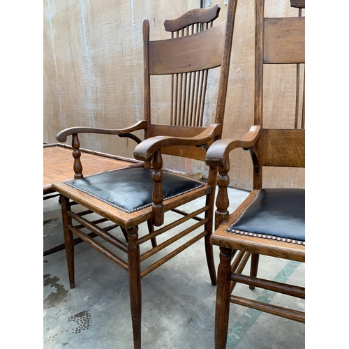 3048 - A PAIR OF ARTS AND CRAFTS OAK ARM CHAIRS