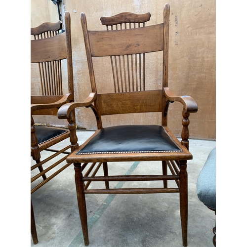 3048 - A PAIR OF ARTS AND CRAFTS OAK ARM CHAIRS