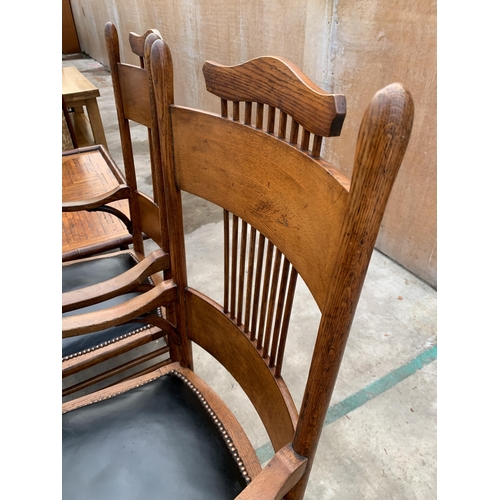 3048 - A PAIR OF ARTS AND CRAFTS OAK ARM CHAIRS