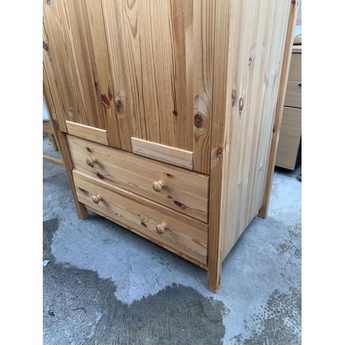 3062 - A PINE TWO DOOR WARDROBE WITH TWO DRAWERS TO BASE, 31