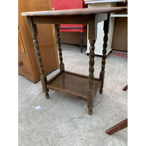 3067 - AN EARLY 20TH CENTURY OAK OCCASIONAL TABLE ON BARLEY LEGS , 26