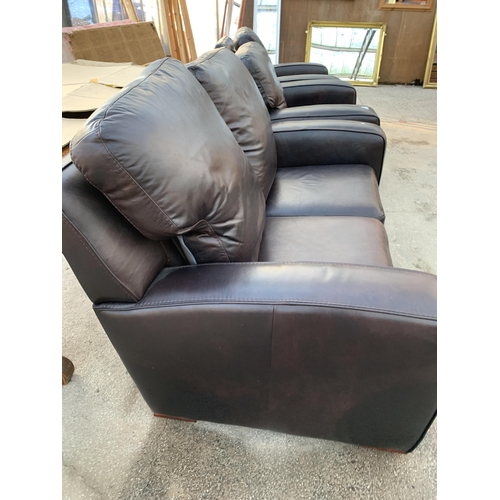 3071 - A BROWN LEATHER THREE PIECE SETTEE.