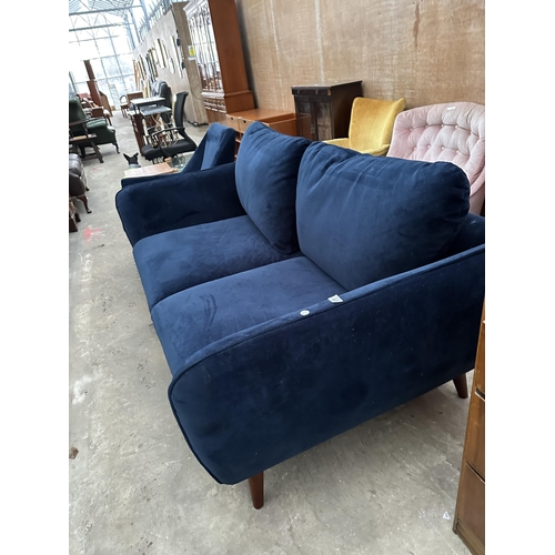 3073 - A MODERN BLUE TWO SEATER SETTEE AND MATCHING CHAIR ON TAPERING LEGS.