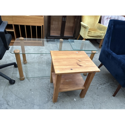 3074 - A GLASS COFFEE TABLE AND A PINE LAMP TABLE