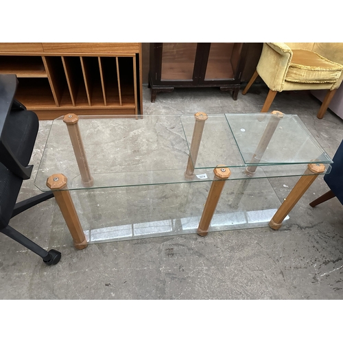 3074 - A GLASS COFFEE TABLE AND A PINE LAMP TABLE