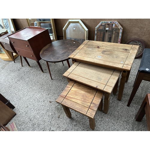 3084 - A NEST OF THREE MEXICAN PINE TABLES, A COFFEE TABLE AND A SMALL TWO DRAWER CHEST.