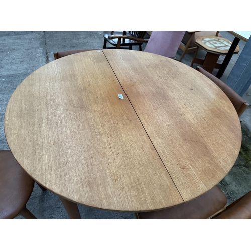 3097 - A MCINTOSH RETRO TEAK EXTENDING DINING  TABLE {45