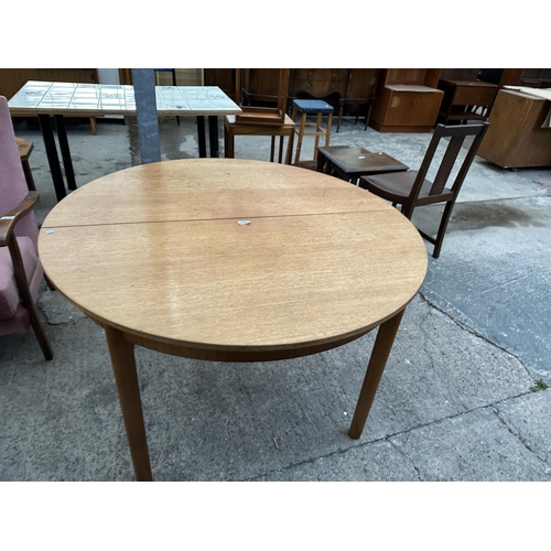 3097 - A MCINTOSH RETRO TEAK EXTENDING DINING  TABLE {45