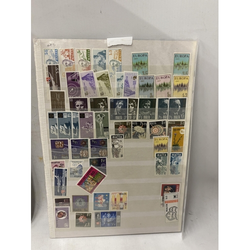 356 - FOUR PAGES OF MINT MALTA STAMPS