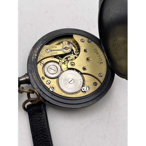 513 - AN ANTIQUE OMEGA GENTS GUN METAL POCKET WATCH WITH LEATHER ALBERT 47MM SEEN WORKING BUT NO WARRANTY